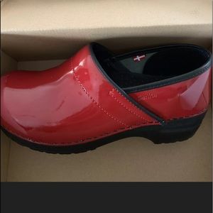 Sanita Red Clogs